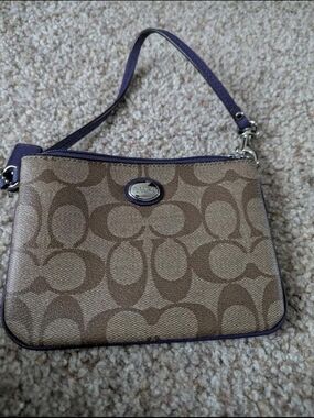 Coach Tan Signature Canvas Wristlet with Purple Trim